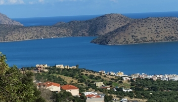 ELPL6590 – 29.981m² Plot of land with uninterrupted sea view in Elounda